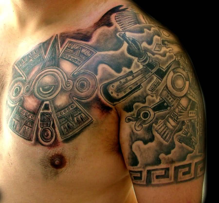 https://www.askideas.com/media/61/Mexican-Mayan-Tattoo-On-Chest-And-Shoulder-by-Piglegion.jpg
